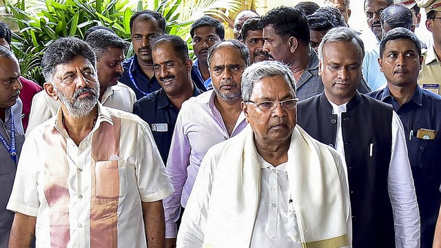 Karnataka chief minister Siddaramaiah, deputy chief minister DK Shivakumar, with Congress MLAs in Bengaluru. (PTI)
