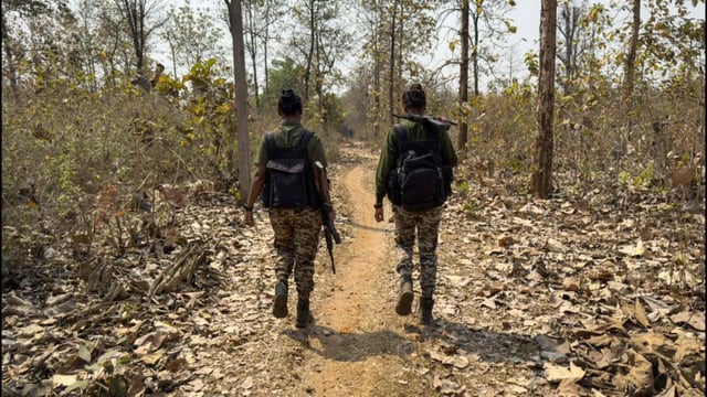 District Reserve Guard personnel patrol in Bastar division of Chhattisgarh. (AFP)