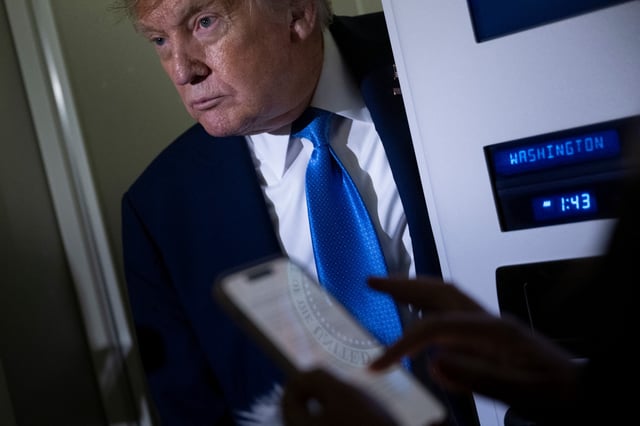 U.S. President Donald Trump speaks to reporters about the G7 Summit aboard Air Force One while travelling back to Washington from Canada on June 16, 2025.