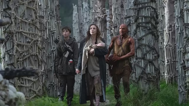 28 Years Later movie review: Alfie Williams, Jodie Comer, and Ralph Fiennes in a still from the film.