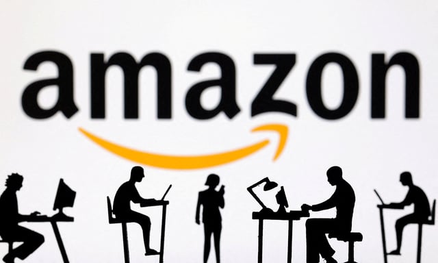 Figurines with computers and smartphones are seen in front of Amazon logo in this illustration taken, February 19, 2024. REUTERS/Dado Ruvic/Illustration/File Photo
