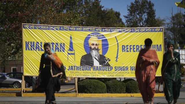 A photograph of late temple president Hardeep Singh Nijjar is seen on a banner outside the Guru Nanak Sikh Gurdwara Sahib in Surrey, British Columbia, on September 18, 2023. (AP)