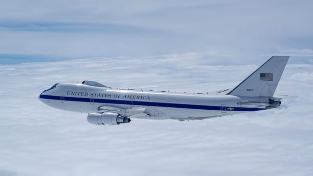 The E-4B is a militarized version of the Boeing 747-200, consisting of four engines, a swept-wing design, and capable of long-range, high-altitude operations and in-flight air refueling.