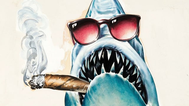 Jaws smoking a cigar.