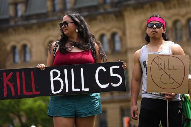 People rally against Bill C-5 on Parliament Hill in Ottawa, on Tuesday, June 17, 2025. THE CANADIAN PRESS/Justin Tang