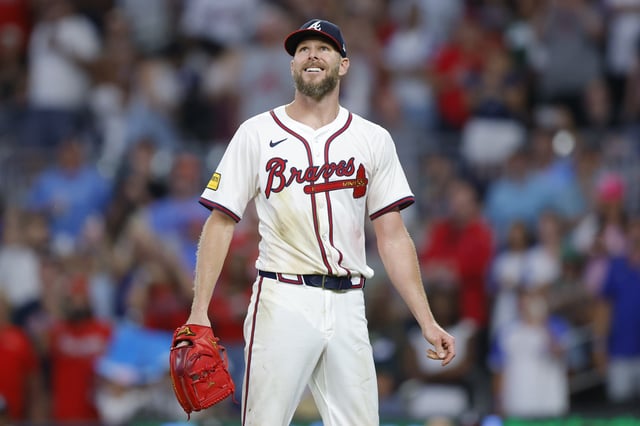 ATLANTA, GEORGIA - JUNE 18: Chris Sale #51 of the Atlanta Braves reacts during the ninth inning against the New York Mets at Truist Park on June 18, 2025 in Atlanta, Georgia.
