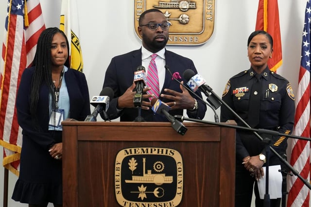 Memphis Mayor Paul Young, center, said a man jumped a wall leading into his subdivision and walked straight to his home before knocking on the door &#34;with gloves on, a full pocket and a nervous demeanor.&#34; (GEORGE WALKER IV/AP FILE)