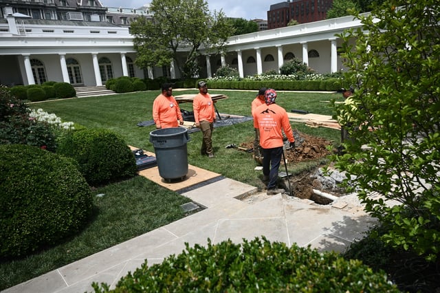 A labor crew works in the Rose Garden of the White House on June 9, 2025, in Washington, DC.