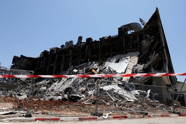 A building at the campus of the Weizmann Institute of Science remains damaged following an Iranian missile strike on Sunday, in Rehovot, Israel June 19, 2025. REUTERS/Violeta Santos Moura