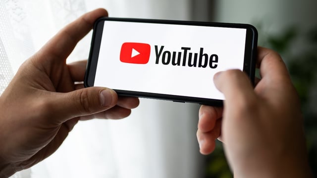 POLAND - 2023/07/13: In this photo illustration a YouTube logo seen displayed on a smartphone. (Photo Illustration by Mateusz Slodkowski/SOPA Images/LightRocket via Getty Images)