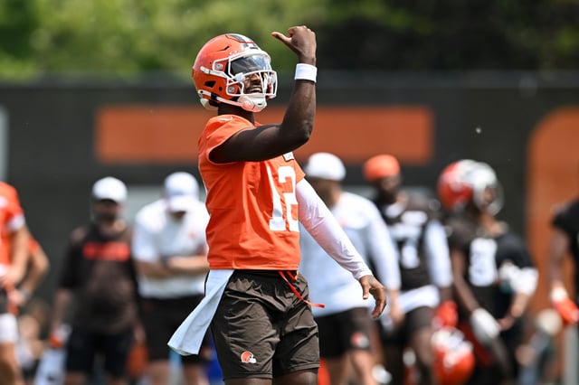 Shedeur Sanders #12 of the Cleveland Browns celebrates during Cleveland Browns OTA offseason workouts at CrossCountry Mortgage Campus on June 04, 2025 in Berea, Ohio.