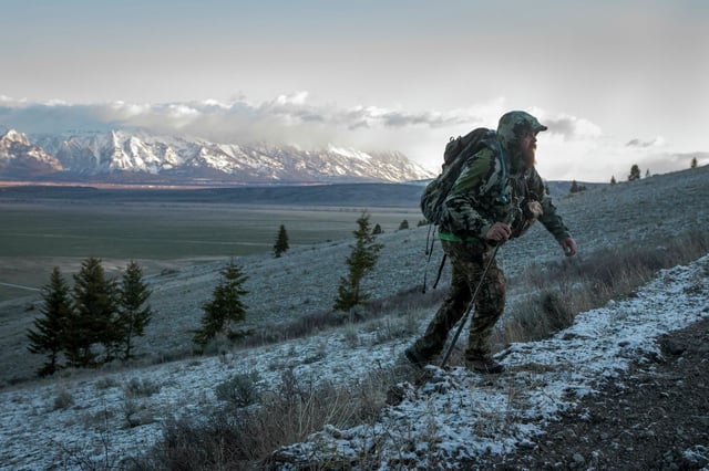 FILE: Brandon Nash hikes in the Bridger-Teton National Forest near Jackson, Wyo., on May 1, 2024. Large swaths of the Bridger-Teton National Forest are eligible for sale in a Senate GOP public land sale proposal.