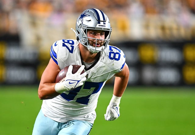 Jake Ferguson #87 of the Dallas Cowboys in action during the game against the Pittsburgh Steelers at Acrisure Stadium on October 6, 2024 in Pittsburgh, Pennsylvania.