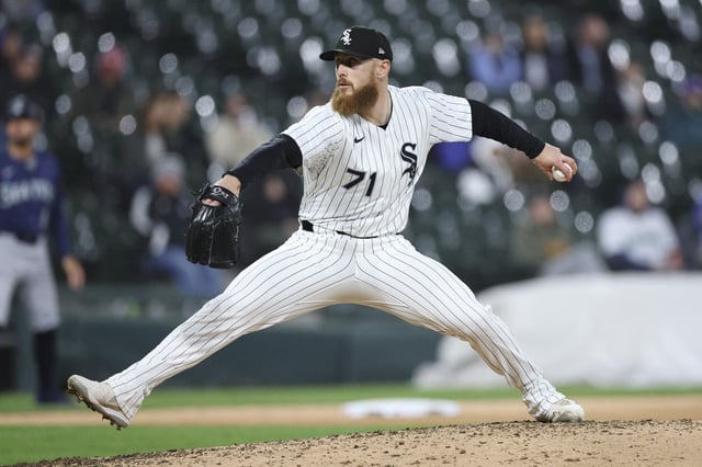 May 19, 2025; Chicago, Illinois, USA; Chicago White Sox relief pitcher Cam Booser (71) delivers a pitch against the Seattle Mariners during the eight inning at Rate Field. Mandatory Credit: Kamil Krzaczynski-Imagn Images/File Photo