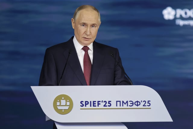 In this photo released by the Roscongress Foundation, Russian President Vladimir Putin speaks at a plenary session of the St. Petersburg International Economic Forum in St. Petersburg, Russia, Friday, June 20, 2025.