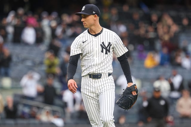 May 22, 2025; Bronx, New York, USA; New York Yankees relief pitcher Luke Weaver (30) reacts after closing the game against the Texas Rangers at Yankee Stadium. Mandatory Credit: Vincent Carchietta-Imagn Images/File Photo