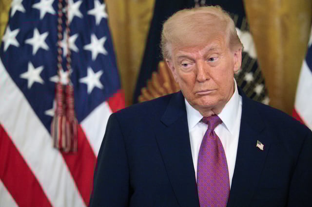 President Donald Trump can be seen delivering remarks before signing a series of bills related to California’s vehicle emissions standards during an event in the East Room of the White House on June 12, 2025, in Washington, D.C. (Photo by Chip Somodevilla/Getty Images)
