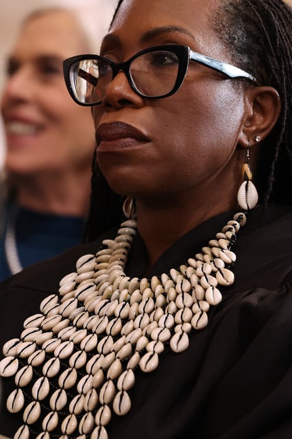 Supreme Court Associate Justices Ketanji Brown Jackson wears a collar and matching earrings made from cowrie shells during the inauguration ceremonies in the Rotunda of the U.S. Capitol on January 20, 2025 in Washington, D.C.