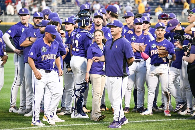 Jun 14, 2025; Omaha, Neb, USA;  LSU Tigers head coach Jay Johnson gathers with the team after the win against the Arkansas Razorbacks at Charles Schwab Field. Mandatory Credit: Steven Branscombe-Imagn Images/File Photo