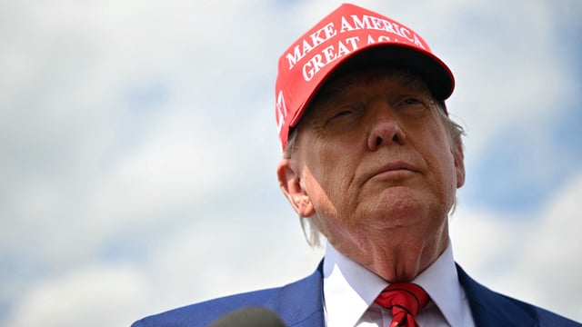 US President Donald Trump speaks to the press upon arrival at Morristown Municipal Airport in Morristown, New Jersey, on June 20, 2025. Trump is heading to his Bedminster golf resort for a MAGA Inc. fundraising dinner. (Photo by Mandel NGAN / AFP) (Photo by MANDEL NGAN/AFP via Getty Images)