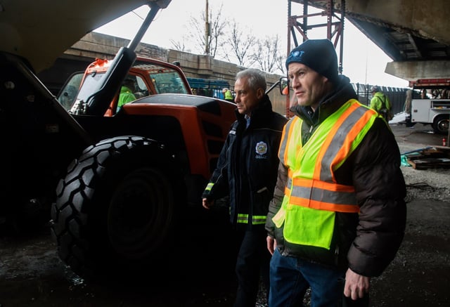 Tom Carney, then First Deputy Commissioner at Chicago Department of Transportation, right, tours a site with then Chicago Mayor Rahm Emanuel, where crews are repairing a cracked beam on the ramp to DuSable Lake Shore Drive on Feb. 12, 2019. (Zbigniew Bzdak/Chicago Tribune)
