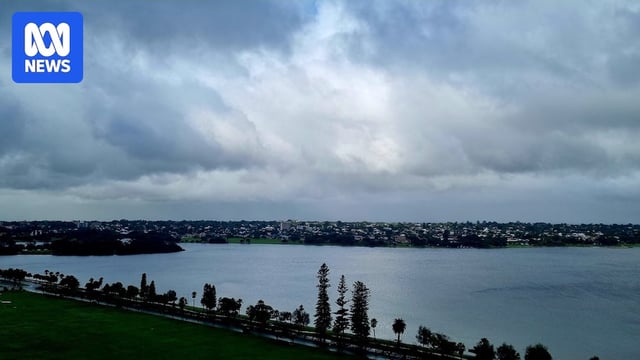 dark clouds hover over perth cbd