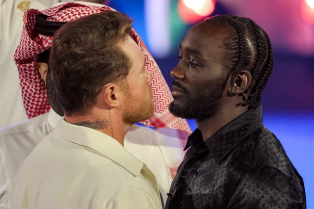 Terence Crawford, right, faces off against Canelo Alvarez during a press conference in Riyadh, Saudi Arabia ahead of their super middleweight title fight in September.