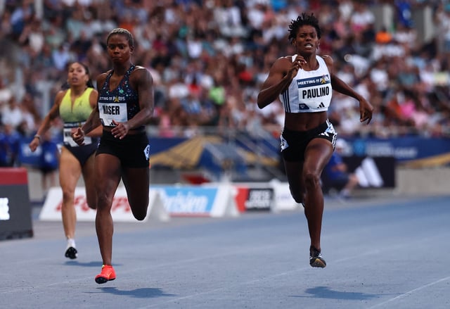 Athletics - Diamond League - Paris - Charlety Stadium, Paris, France - June 20, 2025 Bahrain's Salwa Eid Naser and Dominican Republic's Marileidy Paulino in action during the women's 400m final REUTERS/Gonzalo Fuentes