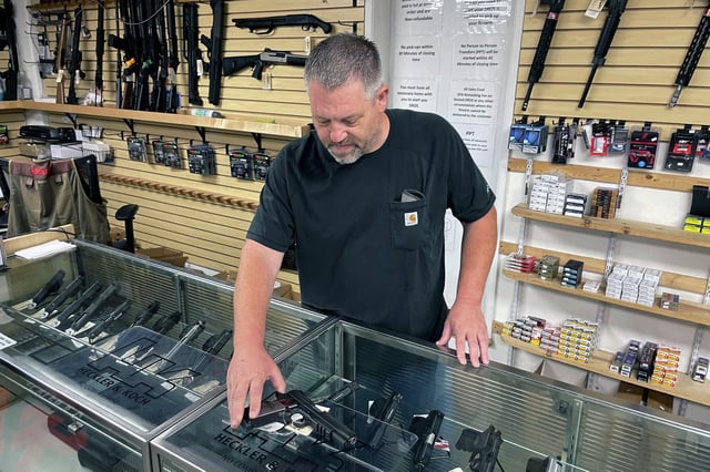 Customers who visit Coyote Point Armory in Burlingame, and co-owner John Parkin, should be allowed to buy more than one gun a month, an appeals court ruled Friday.  