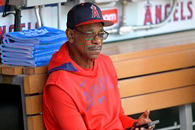 Los Angeles Angels manager Ron Washington sits in the dugout prior to a game at Angel Stadium on May 26, 2025.