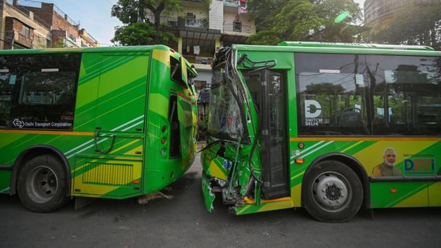 The damaged DTC buses parked outside Ranjit Nagar Police Station on Friday. (Sanchit Khanna/HT photo)