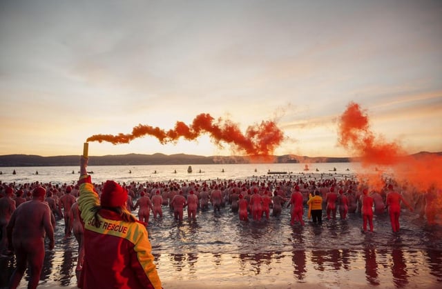 Thousands came to swim in the nude in Hobart’s freezing waters to celebrate the winter solitice. 