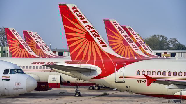 Air India planes are parked at the Indira Gandhi International Airport in New Delhi. (PTI file)