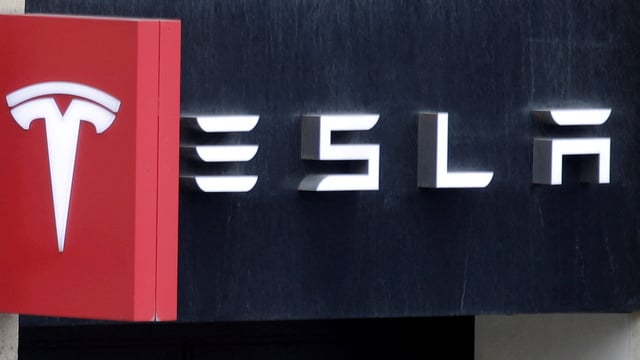 Tesla is reportedly set to open its first India showrooms this July. Here's what we know about their location and rent. (Representational photo) REUTERS/Charles Platiau/File Photo