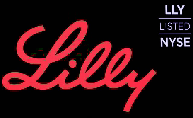 The logo and ticker for Eli Lilly and Co. are displayed on a screen on the floor of the New York Stock Exchange (NYSE) in New York, U.S., May 18, 2018. REUTERS/Brendan McDermid/File Photo