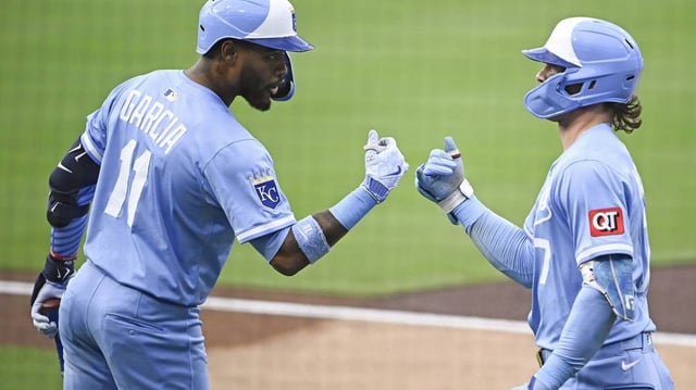 Jun 20, 2025; San Diego, California, USA; Kansas City Royals shortstop Bobby Witt Jr. (7) is congratulated by Maikel Garcia (11) after hitting a solo home run during the first inning against the against the against the San Diego Padres at Petco Park. Mandatory Credit: Denis Poroy-Imagn Images
