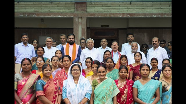Bihar chief minister Nitish Kumar with Deputy CMs Samrat Choudhary and Vijay Kumar Sinha and others poses for pictures after the 'Mahila Samvad' program in Patna on Saturday. (PTI)