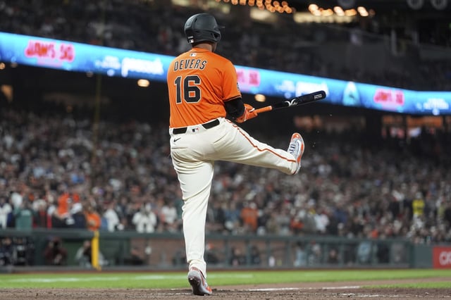 San Francisco Giants' Rafael Devers (16) reacts after striking out against the Boston Red Sox during the ninth inning of a baseball game in San Francisco, Friday, June 20, 2025. (AP Photo/Jeff Chiu)