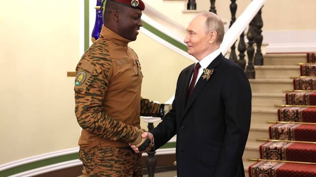 Russian President Vladimir Putin (R) this week said he has not ruled out capturing another major Ukrainian city through military force. File Photo by Russian Presidential Office/UPI