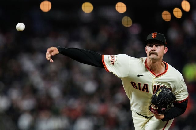 San Francisco Giants pitcher Sean Hjelle throws to a Cleveland Guardians batter during the eighth inning of a baseball game Wednesday, June 18, 2025, in San Francisco.