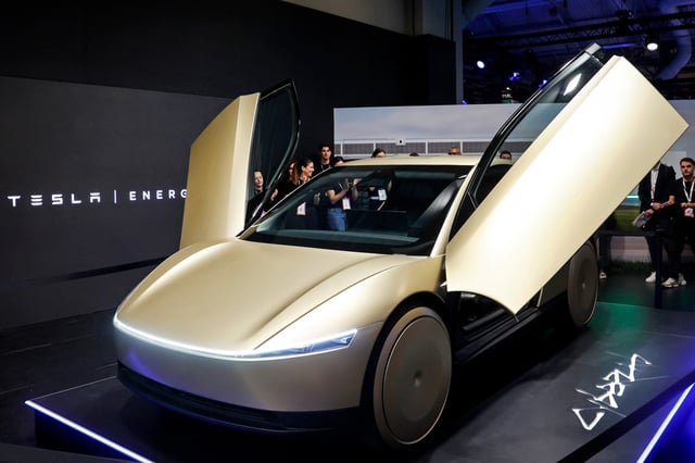 A Tesla Cybercab/Robotaxi two-passenger battery-electric self-driving car at Parc des Expositions Porte de Versailles, in Paris, on June 12, 2025.