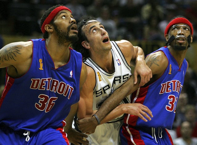 The Spurs&#39; Manu Ginobili is sandwiched between the Pistons&#39; Rasheed Wallace, left, and Richard Hamilton while looking for a freethrow rebound during first quarter of game two NBA Finals Sunday, June 12, 2005 at the SBC Center in San Antonio. History often remembers Game 7s as a matter of destiny, but that ignores the fight it takes to win an NBA title. BAHRAM MARK SOBHANI/STAFF