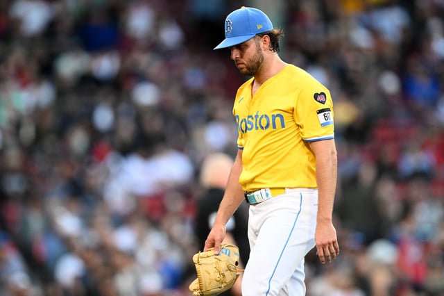 Sep 28, 2024; Boston, Massachusetts, USA; Boston Red Sox starting pitcher Kutter Crawford (50) walks of the field after being taken out of the game in the fifth inning against the Tampa Bay Rays at Fenway Park. Mandatory Credit: Brian Fluharty-Imagn Images/File Photo