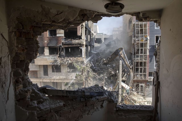 The view from a living room of a residential building that was destroyed by an Israeli attack, on June 13, 2025, in Tehran, Iran.