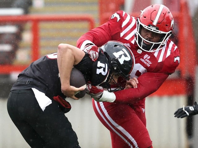  Stampeders defensive lineman Jaylon Hutchings sacks Redblacks quarterback Dustin Crum for a safety in the first half of Saturdays game.