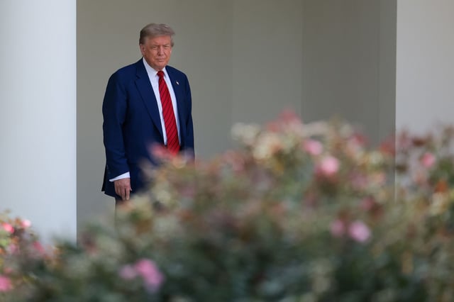 President Donald Trump walks out of the Oval Office on June 20, 2025.