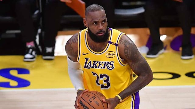Apr 30, 2025; Los Angeles, California, USA; Los Angeles Lakers forward LeBron James (23) controls the ball against the Minnesota Timberwolves during the second half in game five of first round for the 2025 NBA Playoffs at Crypto.com Arena. Mandatory Credit: Gary A. Vasquez-Imagn Images