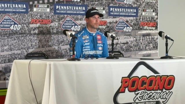 Denny Hamlin sits Saturday, June 21, 2025, at the podium in the Pocono Raceway Media Center after winning the pole for Sunday’s Great American Getaway 400. (Keith Groller / The Morning Call)