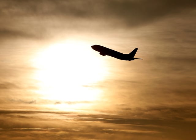 A plane is seen during sunrise at the international airport in Munich, Germany, January 9, 2018.    REUTERS/Michaela Rehle/File Photo
