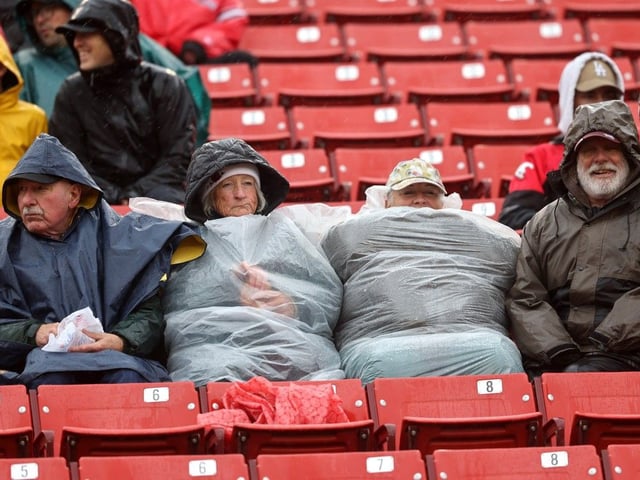 Fans brave the weather as the Calgary Stampeders battle the Ottawa Redblacks in CFL action at McMahon stadium in Calgary on Saturday, June 21, 2025. Darren Makowichuk/Postmedia
